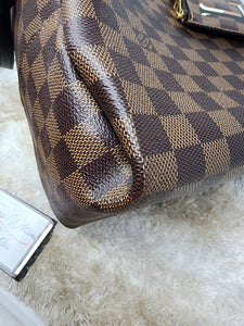 LOUIS VUITTON DE BELMONT AND POUCH