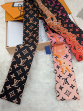 LOUIS VUITTON RISING CONFIDENTIAL BANDEAU
