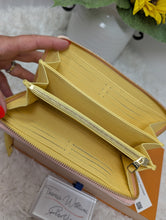 LOUIS VUITTON EMPREINTE SPRING IN THE CITY ZIPPY WALLET