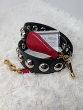 Gucci Maxi Stud Shoulder Strap in black leather with hibiscus red backing and gold-tone hardware