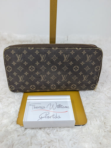 LOUIS VUITTON MINI LIN ZIPPY WALLET