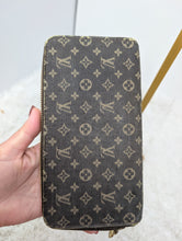 LOUIS VUITTON MINI LIN ZIPPY WALLET
