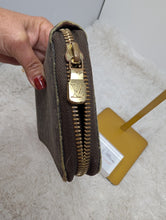 LOUIS VUITTON MINI LIN ZIPPY WALLET