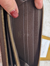 LOUIS VUITTON MINI LIN ZIPPY WALLET