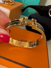 HERMES CLIC BLACK/GOLD BRACELET, SIZE SMALL