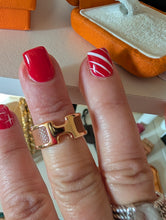 Hermès Olympe ring in a beige calfskin leather with rose gold plated hardware, size 6, box