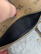 LOUIS VUITTON MONOGRAM REVERSE METIS POCHETTE