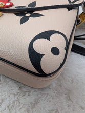 LOUIS VUITTON LIMITED EDITION CRAFTY METIS POCHETTE