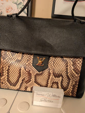 LOUIS VUITTON LOCKME MM PYTHON