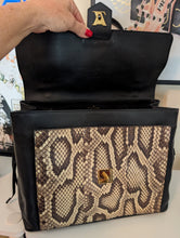 LOUIS VUITTON LOCKME MM PYTHON