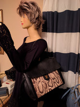 LOUIS VUITTON LOCKME MM PYTHON