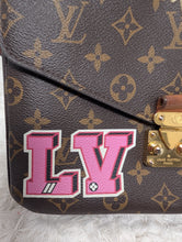 LOUIS VUITTON LIMITED EDITION TRAVEL PATCHES METIS POCHETTE