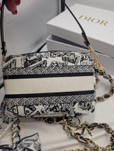 AUTHENTIC DIOR GWP, BLACK TOILE TOILETRY POUCH WITH 2 NON BRAND STRAPS & BOW CLIP ON CHARM, AUTHENTICITY CARD & BOX