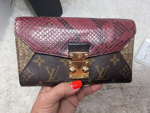 LOUIS VUITTON MAJESTUEUX WALLET
