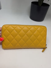 CHANEL YELLOW CAVIAR ZIPPY WALLET