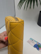 CHANEL YELLOW CAVIAR ZIPPY WALLET