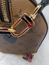 LOUIS VUITTON MONOGRAM TRUNK SPEEDY 25 BANDOLIERE, LIKE NEW