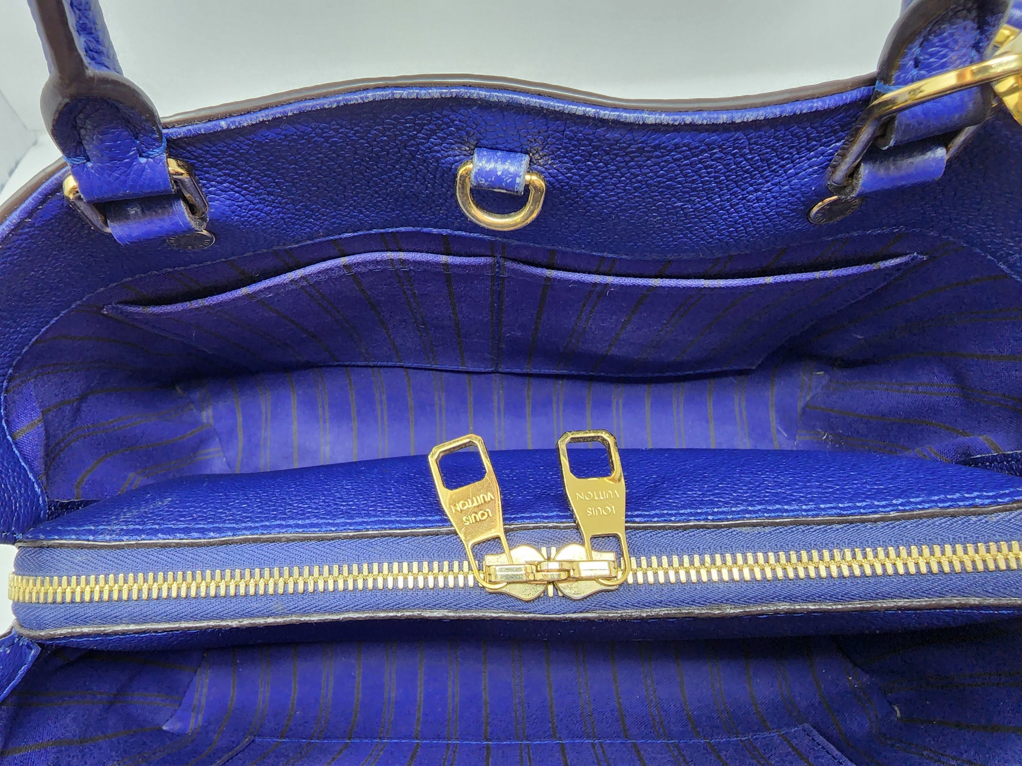 Louis Vuitton Montaigne MM Blue Monogram Empreinte Leather ref